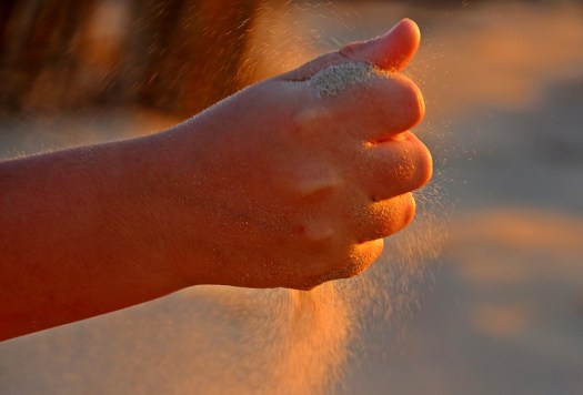 sand going through fist
